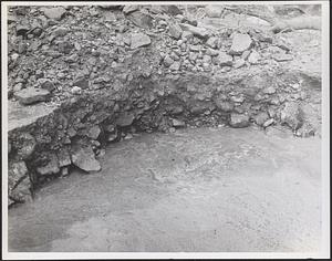 Test pit 1, showing gravel and water and hole