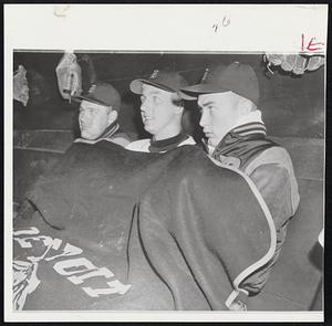Long Underwear, Hot Water Bottles and blankets were standard gear yesterday as 2810 hardy fans turned out to watch Red Sox play Tigers in Detroit in 39 degree temperature. Watching action from Tigers' dugout are, from left, Harvey Kuenn, Al Kaline and Jim Small.