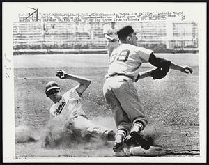 Minneapolis - St. Paul, Minn.: Minnesota Twins Jim Hall (left), steals third base safety during 4th inning of Minnesota-Boston first game of doubleheader here 7/5. Boston third baseman Dalton Jones tries for throw from catcher.