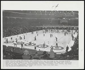 Curlers Open Tourney -- This was the scene at the Chicago Stadium last night as the first U.S. Men's National Curling Championship got under way. Competing are top curlers from Illinois, Massachusetts, Michigan, Minnesota, North Dakota, New Hampshire, New York, Washington, Wisconsin and Alaska. Meet runs four days.