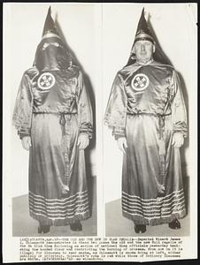 The Old and The New in Klan Regalia--Imperial Wizard James A. Colescott demonstrates in these two poses to old and the new full regalia of the Ku Klux Klan following an action of national Klan officials yesterday banishing the hooded visor and restricting the burning of crosses. From now on it is illegal for Klansmen to wear masks, as Colescott is shown doing at left, either publicly or privately. Colescott's robe is red while those of ordinary Klansmen are white.