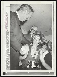 Marathon Winner Congratulated--Boston's Mayor Kevin White congratulates Alvaro Mejia of Colombia after he won the 75th Boston A.A. Marathon in 2:18.45 in Boston Monday. Behind Mejia is B.A.A. Director Will Clooney.