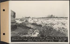 Contract No. 80, High Level Distribution Reservoir, Weston, looking east from Sta. 886+00, showing twin aqueduct excavation, high level distribution reservoir, Weston, Mass., Jan. 5, 1940