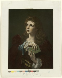 Young woman holding a green book
