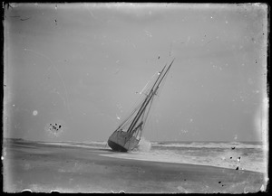 Schooner ashore on beach. Possibly schooner Basile