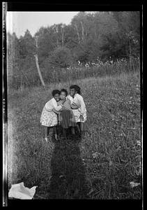 Three girls in a field
