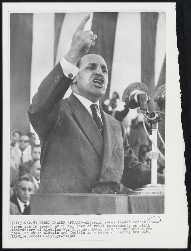 Rebel Leader Speaks - Algerian rebel Leader Ferhat Abbas waves arm in speech at Tunis, seat of rebel government, Sixth anniversary of Algerian War Tuesday. Abbas said he supports a proposal to unite Algeria and Tunisia as a means of ending the war.