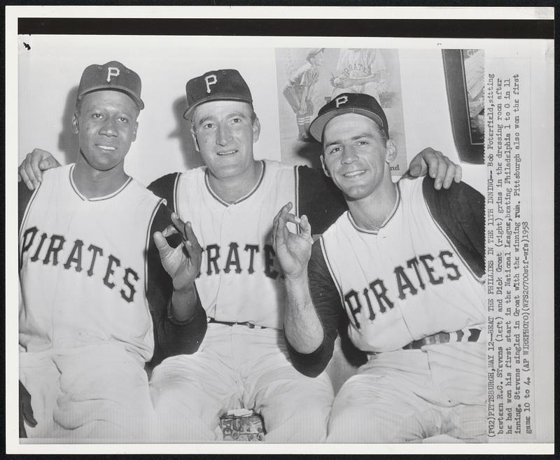 Beat the Phillies in the 11th Inning -- Bob Poterfield, sitting between R.C. Stevens (left) and Dick Groat (right) grins in the dressing room after he had won his first start in the National League, beating Philadelphia 1 to 0 in 11 inning. Stevens singled in Groat with the winning run. Pittsburgh also won the first game 10 to 4.