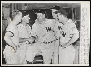 Chicago – Bobo Says Goodbye To Pals – Bobo Newsom (center) veteran pitcher who has been obtained by the New York Yankees from the Washington Senators, bids farewell last night to teammates Gerald Priddy, Stan Spence, Sid Hudson, and Al Evans (left to right) of the Senators. Newsom will join the Yanks Sunday in Chicago.
