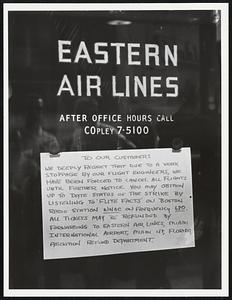 Handwritten sign on Eastern Air Lines office door which states, "To our customers. We deeply regret that due ot a work stoppage by our flight engineers, we have been forced to cancel all flights until futher notice. You may obtain up to date status of the strike by listening to 'Flite Facts' on Boston Radio Station WNAC on frequency 680. All tickets may be refunded by forwarding to Eastern Air Lines, Miami International Airport, Miami 48, Florida, Attention Refund Department."