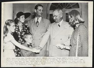 President Greets Tobins – President Truman greets members of family the family of his new Secretary of Labor, Maurice J. Tobin of Boston, at the White House today. Left to right: Carol Ann, 13; Mrs. Tobin; Maurice Jr., 10 (front); Tobin; Truman, and Hellen Louise, 15. The former Massachusetts Mayor was sworn in as successor of the late Lewis B. Schwellenbach earlier in the day.