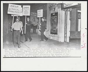 Priests Picket Movie Theater--The Rev. Edwin C. O'Connell (center) of St. Mary's Roman Catholic church and the Rev. Bartholomew J. Laurello (right) of St. Catherine's R. C. church join pickets (unidentified) protesting the showing of the film "The French Line" at a Greenwich theater. The film, condemned