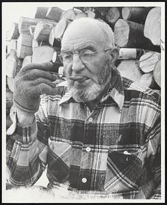 Tests Syrup...Paul Gay, New London, N.H., Tastes Sample From Vat of Maple Syrup. He Sets Out 1,850 Buckets and Produces Up to 400 Gallons.