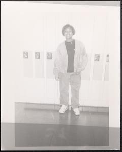 Young woman in front of lockers