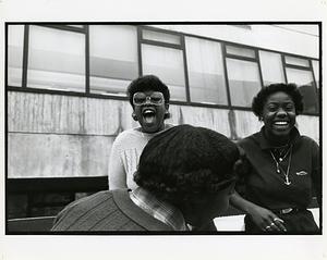 Two students laughing