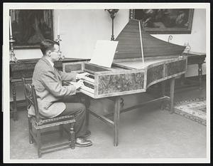 Banks-Built Harpsichord is demonstrated by Ridgway M. Banks of Cambridge, a senior at Williams College, who built the instrument during vacation periods. Banks recently was awarded the $6,000 Hubbard Hutchinson Memorial Fellowship for two years of graduate study in music, an award given by Williams College on the basis of unusual creativity in art, music, or writing.