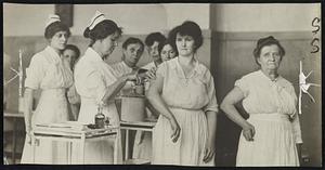 Innoculating group of nurses at City Hospital with grip vaccine to check the spread of the epidemic