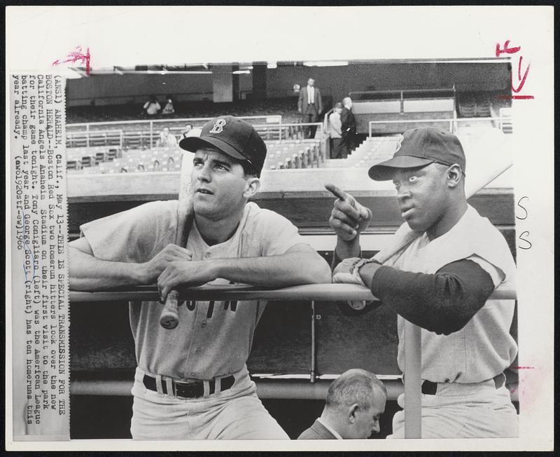 Anaheim, Calif. -- This Is Special Transmission For The Boston Herald -- Boston Red Sox two home run hitters look over the new California Angels Anaheim Stadium on their first visit to the park for their game tonight. Tony Conigliaro (left) was the American League batting champ last year and George Scott (right) has ten home runs this year already.