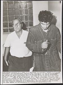 Arraigned in slaying