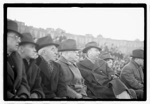 Boston Parks Department Commissioner William Long watching a football game, Back Bay Fens