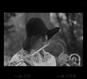 Cindy Tassarini plays the flute in the summer, Boston Common