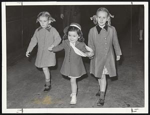 Paramount’s Youngest Film Star, Carolyn Lee, center, with Mayor Tobin’s daughters, Helen Louise, left, and Carol Ann. The young star visited Boston last night in advance of her first picture, “Honeymoon in Bali,” which is to be shown soon at the Metropolitan Theatre.