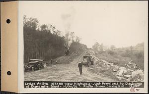Contract No. 21, Portion of Ware-Belchertown Highway, Ware and Belchertown, ledge at sta. 143+80, new highway, just previous to discharge of dynamite blast, Ware and Belchertown, Mass., Oct. 30, 1931