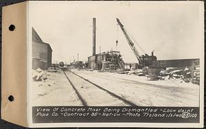 Contract No. 85, Manufacture and Delivery of Precast Concrete Steel Cylinder Pipe, Southborough, Framingham, Wayland, Natick, Weston, view of concrete mixer being dismantled, Natick, Mass., Jan. 3, 1940