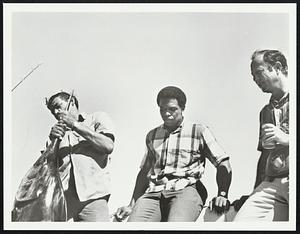 L. to R. professional fisherman, Gale Sayers, Pete Rozelle