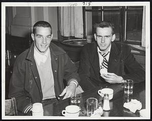 Purple Sophomore Duet combines End Jack Carroll of Albany (left) and Quarterback Gene Schiller of Scotch Plains, N.J. Schiller is the Holy Cross passer who is so capably replacing Charley Maloy, out with ulcers.