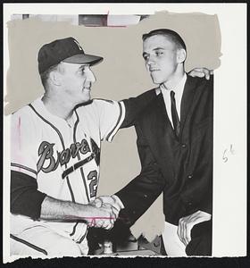 Generation Apart Bonus Boy Dan Schneider, right, 19-year-old Arizona University pitching whiz, meets all-time great Warren Spahn. Schneider, who was signed for a reported $100,000 bonus, will travel with the Tribe on the upcoming trip.