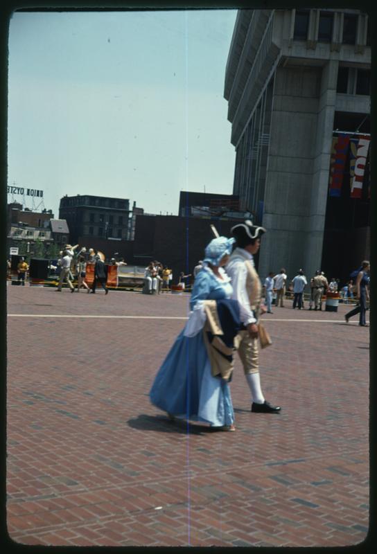 Two people in colonial costume, Boston City Hall Plaza