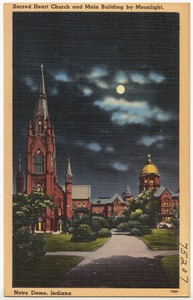Sacred Heart Church and main building by moonlight