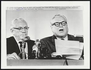 announces at press conference that he will not appeal the loss of the union's presidential election in which I.W. Abel, (L), was declared the winner.