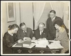 Members of the Mansfield Campaign Staff At Parker House Headquarters. Left to right, Miss Mary Thompson, Secretary; John H. McCarthy, Campaign Manager; Hon. Frederick W. Mansfield; John H. Dorsey, Treasurer; Mrs. Charles S. Mansfield, head of the Women Workers. (Photo made Nov. 1, 1933)