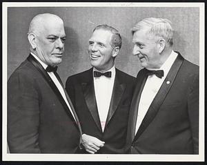 Judges Flank Secretary of State Kevin White at the Law Day dinner of the Boston College Law School Alumni Association at the Sheraton Boston. They are Judge Charles Artesani, left, and Judge John Fenton.