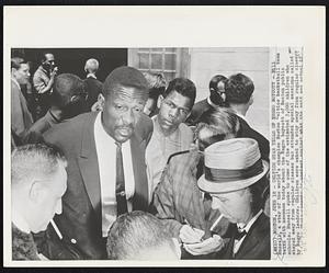 Celtics Star Tells of Negro Boycott- Bill Russell, a star of the world's champion Boston Celtics basketball team talks with newsmen today about the Negro boycott of Boston public schools. Russell spoke to some of the estimated 3,000 children who stayed away from regular classes but attended special sessions called by Negro leaders. Children were asked to stay away from regular classes today by their parents in protest against what the said was actual if not legal segregation.