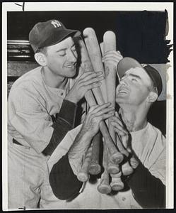 Mr. Russo Takes Over - Not only did Marius Russo (left), pitch the Yankees to victory over the Cardinals yesterday, but took over the series hitting honors from teammates Bill Johnson (right), by clouting two doubles, the second of which led to the winning run.