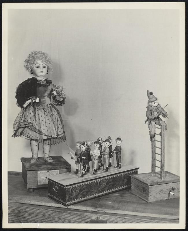 Among 1000 Dolls to be shown at the home of Miss Anna V. Doyle, 63 May street, Jamaica Plain, Saturday are those pictured here. Dolls, which represent more than 30 countries and more than 100 years, are being shown to benefit the Catholic Bureau of Boston.