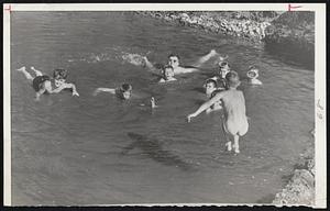 The Old Swimming Hole-100-plus temperatures were no problem to this group of boys who found their dad's idea of an old swimming hole near a woods just outside the Rockford, Illinois, city limits.