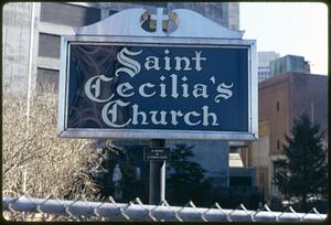 A sign which states "Saint Cecilia's Church"