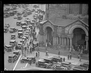 Cars and people by Trinity Church, Boston