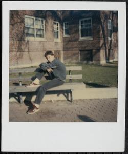 Val Postell sitting on a bench