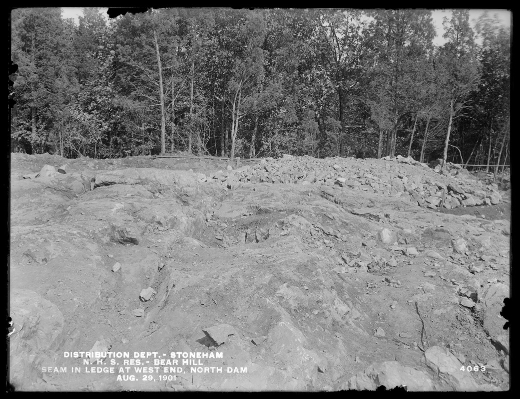 Distribution Department, Northern High Service Bear Hill Reservoir, seam in ledge at west end of north dam, Stoneham, Mass., Aug. 29, 1901