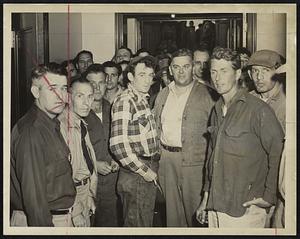 Contractors are shown as they waited their turn in Worcester City hall to obtain permits for repair work in the area devasted by the tornado.