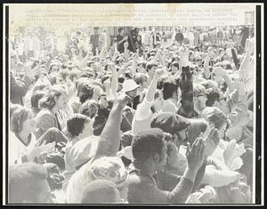 Students raise clenched fists during an anti-war rally in downtown Indianapolis 5/7 -- similar to hundreds of other rallies across the nation in protest to the spreading of the war into Cambodia and government handling of student protests at Kent State and other schools.