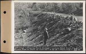 Contract No. 60, Access Roads to Shaft 12, Quabbin Aqueduct, Hardwick and Greenwich, left slope, showing storm damage, looking ahead from Sta. 20+00, Greenwich and Hardwick, Mass., Sep. 28, 1938
