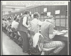 Executive personnel and supervisory employees man the switchboards at Pacific Tel.& Tel. office 7/14, after an estimated 500,000 Bell System workers across the nation went out on strike.