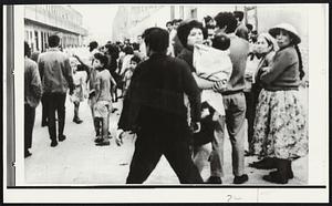 Peruvian tremors crumbled homes and sent residents running into the streets for safety. This picture: A typical scene in downton Lima where residents attempted to escape falling structures. Damage was heavier to the north of Lima where deaths and injuries were numerous. The center of the earthquake was about 150 miles from Lima.