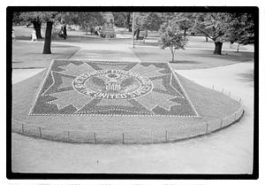 Veterans of Foreign Wars of the United States logo floral design in front of Ether Monument, Public Garden